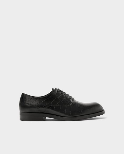 Loafers In Woven Black Leather